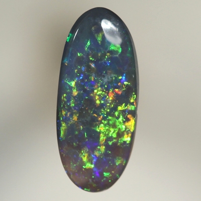 SOLID BLACK OPAL Bright orange and green Pinfire pattern